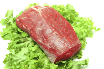 fresh beef meat on green salad