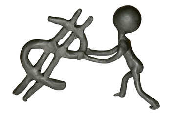 A man of plasticine keeps a sign 