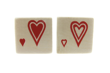 Wooden Blocks with Heart Symbols on White Background