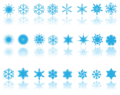 blue snowflakes on white background with reflection