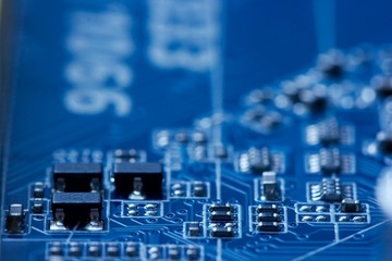 Electronics background in blue with shallow DoF