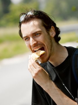 Man eating outdoors