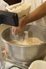 baker who works the paste in a french bakery