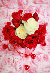 Red and white rose bouquet for Valentine with small hearts