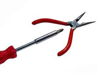 Screwdriver and tongs on a white background