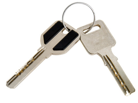 Two metal keys isolated on white background