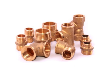 Closeup of a group of copper elbows used in construction
