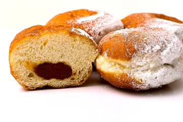 Berlin donuts with apple jam, powdered sugar on top.
