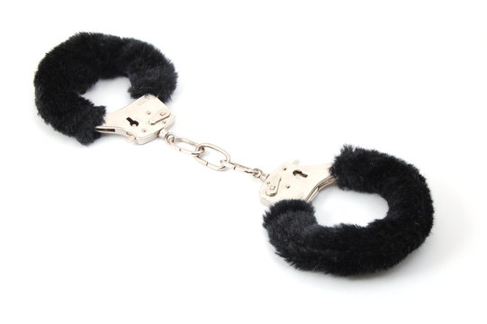 some handcuffs isolated on a white background