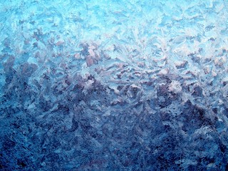 Frosty pattern on window in winter season