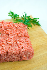 Fresh minced steak on chopping board