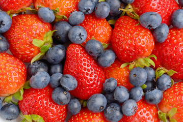Close image of strawberry and blueberry