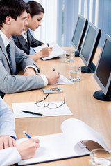 Fototapeta premium Business partners making notes