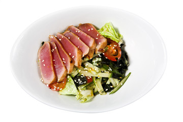 appetizer -  sausage with lettuce on the white plate