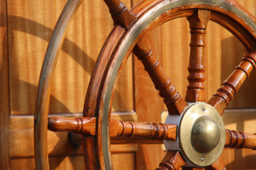 Wooden rudder in a ship. © Smilingworld
