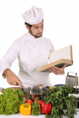 young chef preparing lunch on white background