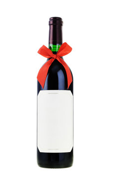 Bottle Of Red Wine Decorated With Bow Ribbon On White