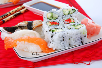 Set of rolls and sushi on several plates