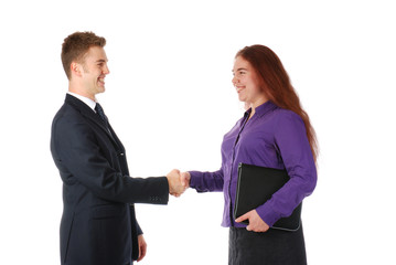 Two partners shaking hands and smiling