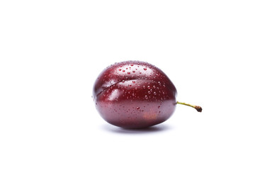 One plum on a white background, isolation
