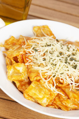 Cooked italian pasta with cheese and tomato. Shallow DOF