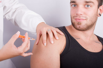 Young doctor women give an injection