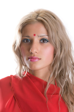 Beautiful young woman in the red sari