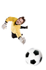 Young goalkeeper in action. Full isolated studio picture