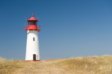 Fototapeta na wymiar Small lighthouse on the island sylt, germany