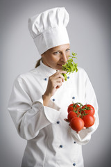 female chef  with fresh, natural ingredients
