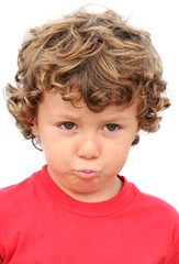 Adorable boy sad and gotten upset on a over white background