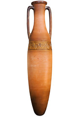 Ancient greek handmade amphora isolated on white
