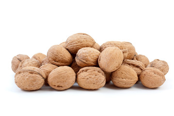 Small pile of walnuts isolated on the white background