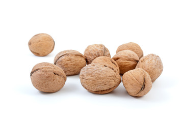 Few walnuts isolated on the white background