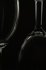 Empty wine glass isolated on black background.