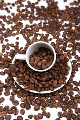 background with white mug and coffee beans