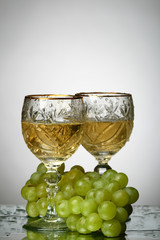 champagne grape and green bottle
