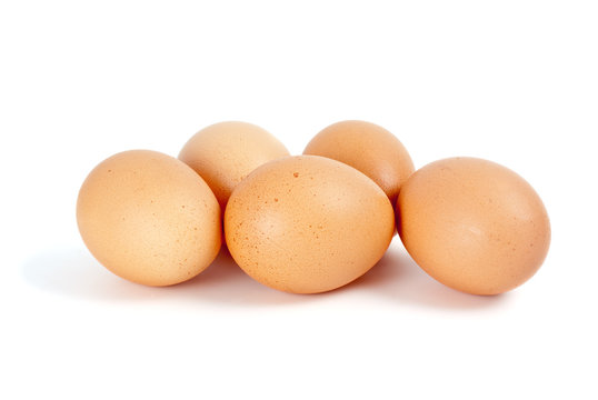 Few eggs isolated on the white background