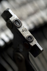 Letter "O", capital and lowercase, on a typewriter key