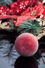 Red ball Christmas decoration on dark background