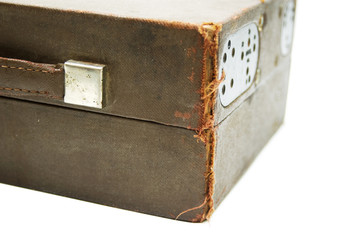 Vintage suitcase closeup on white