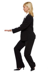 young business woman lifting something isolated on white