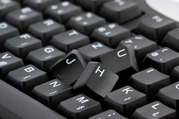 broken black computer keyboard isolated