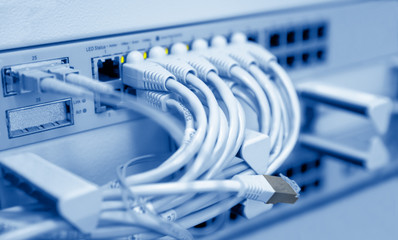 Blue toned image of internet center equipment