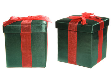 Two neatly wrapped gift boxes isolated over white.
