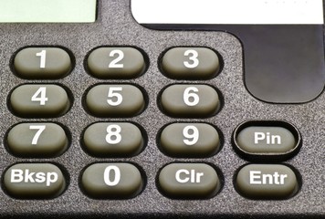 A closeup of an authentication device, with empty space for logo