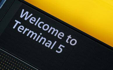 Welcome to Terminal 5 airport sign