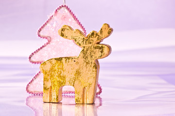 holiday series: christmas golden deer with decorated fir