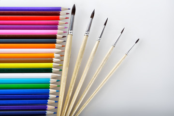 Fototapeta premium Writing materials: coloured pencils background.