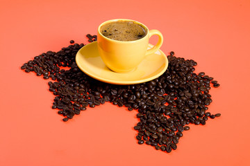 Cup of coffee and coffee beans